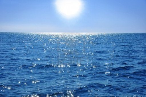5562309-sun-blue-sky-and-ocean-serenity